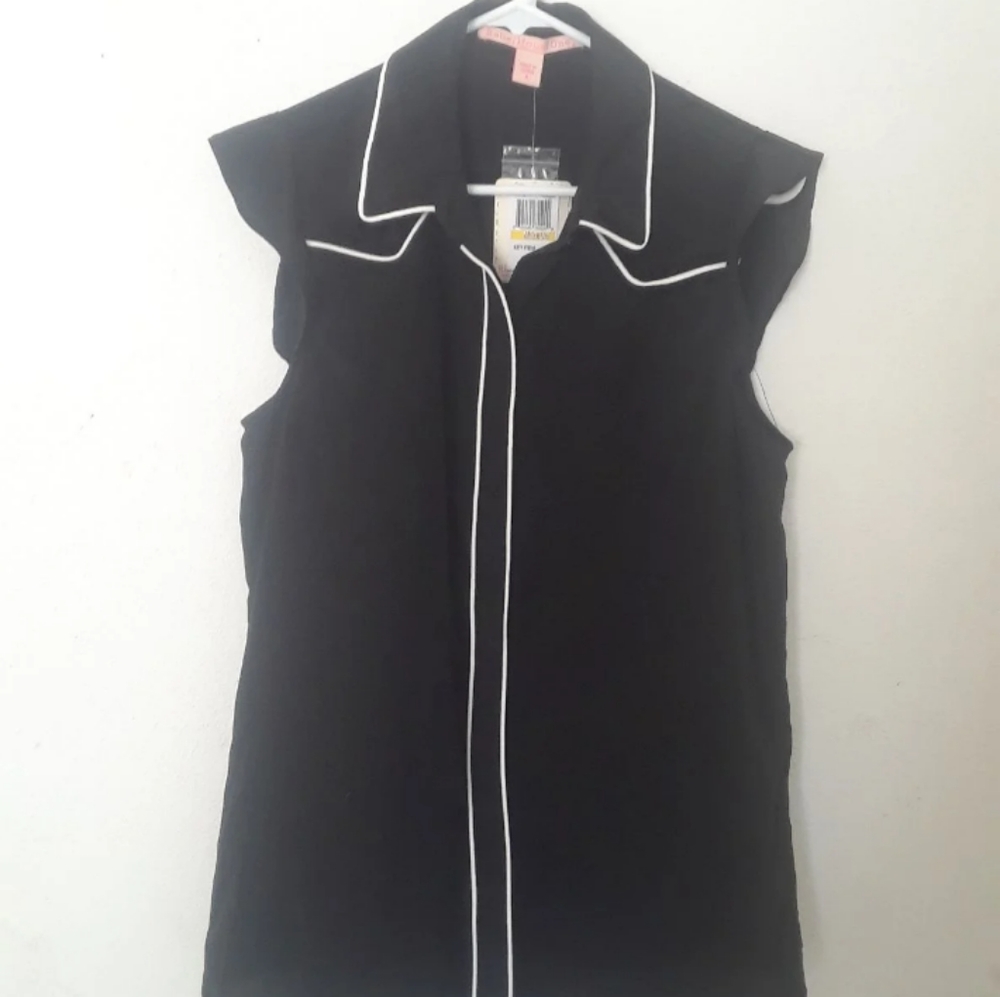 Black sleeveless top with buttons